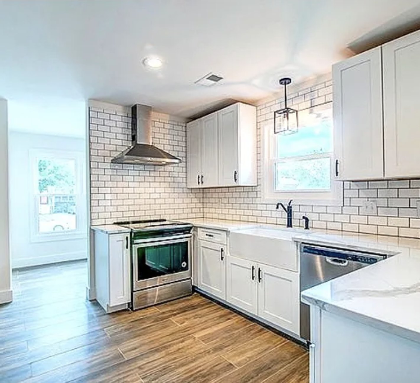 White painted kitchen cabinets with subway tile